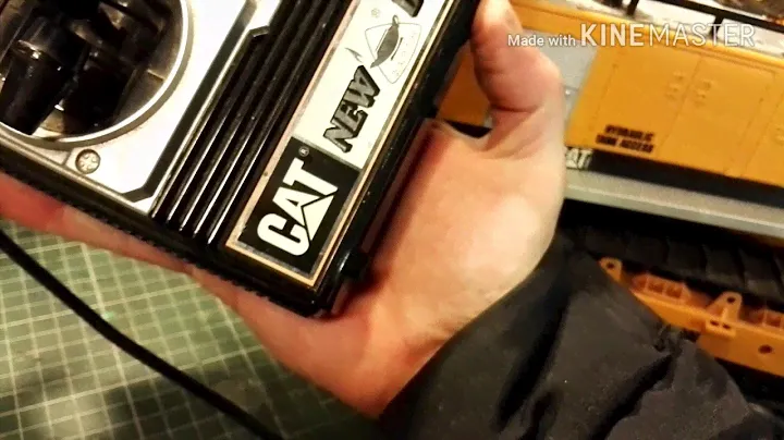 New Bright vintage RC Caterpillar excavator.